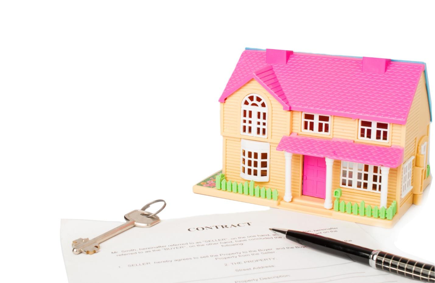 A house and a pen on a paper
Description automatically generated